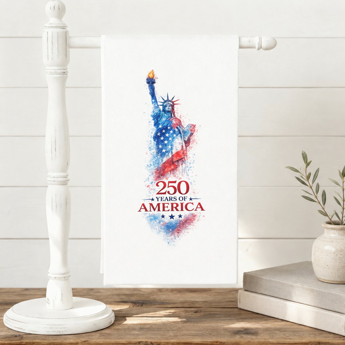 250 Years of America Statue of Liberty tea towel displayed on a towel stand