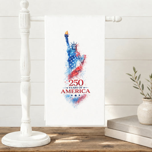 250 Years of America Statue of Liberty tea towel displayed on a towel stand