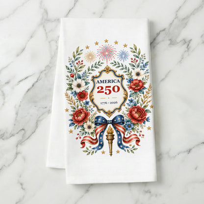 America 250 botanical wreath tea towel styled on a marble background with red white and blue floral anniversary artwork