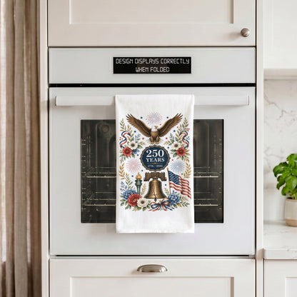 America 250 eagle heritage tea towel hanging on an oven handle