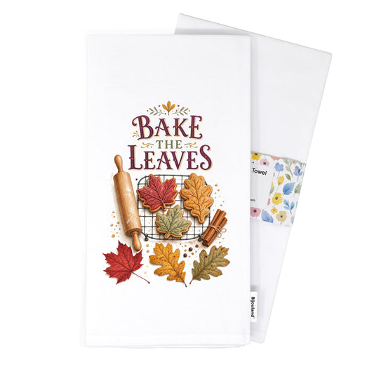 Folded Bake the Leaves Fall Baking Tea Towel presented with its paper belly band and woven label.