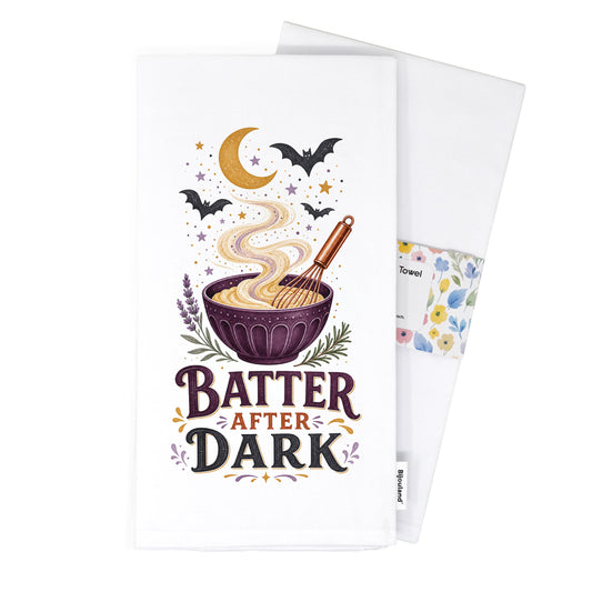 Folded Batter After Dark Halloween Kitchen Towel presented with its paper belly band and woven label.