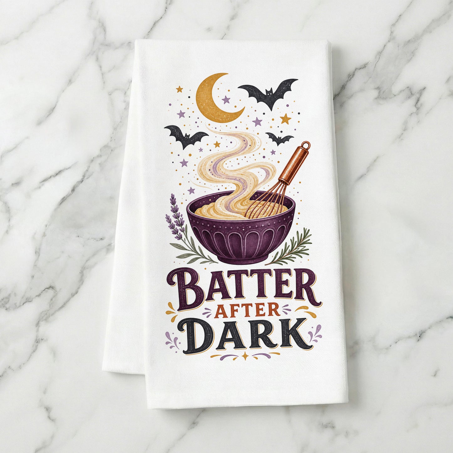 Batter After Dark Halloween Kitchen Towel folded on white marble, with whisk, mixing bowl, curling batter, crescent moon, stars, and bats clearly shown.