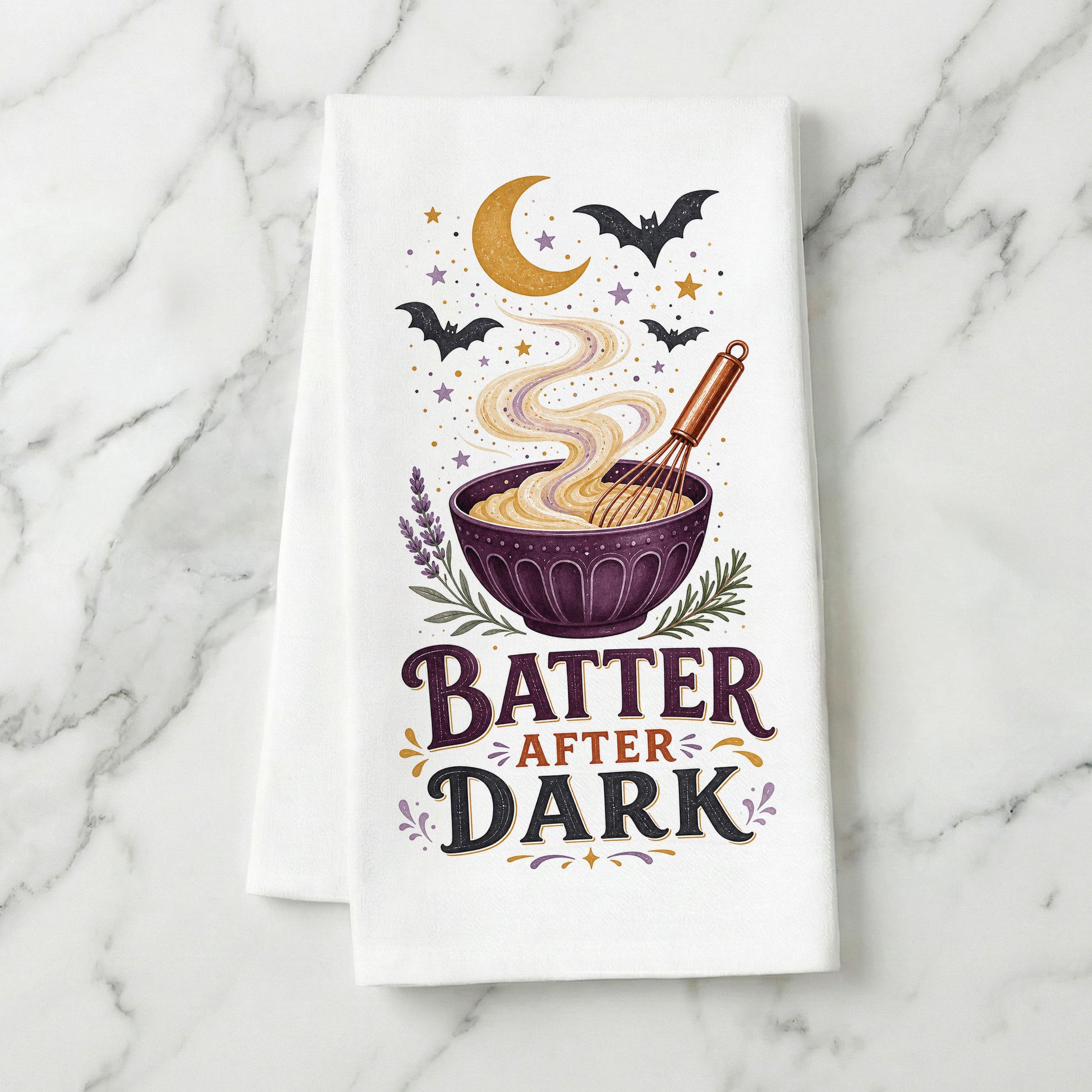 Batter After Dark Halloween Kitchen Towel folded on white marble, with whisk, mixing bowl, curling batter, crescent moon, stars, and bats clearly shown.