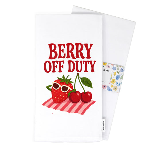 Folded Berry Off Duty tea towel presented with its paper belly band.