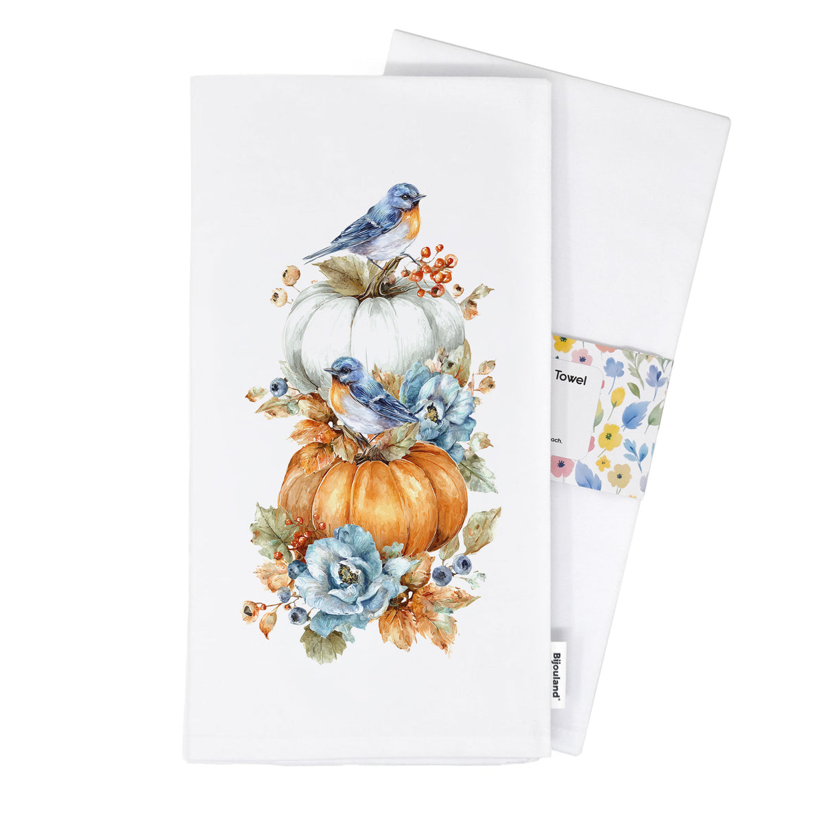 Bluebird Pumpkin tea towel folded with its paper belly band, showing bluebirds, pumpkins, flowers, and Bijouland’s woven label.