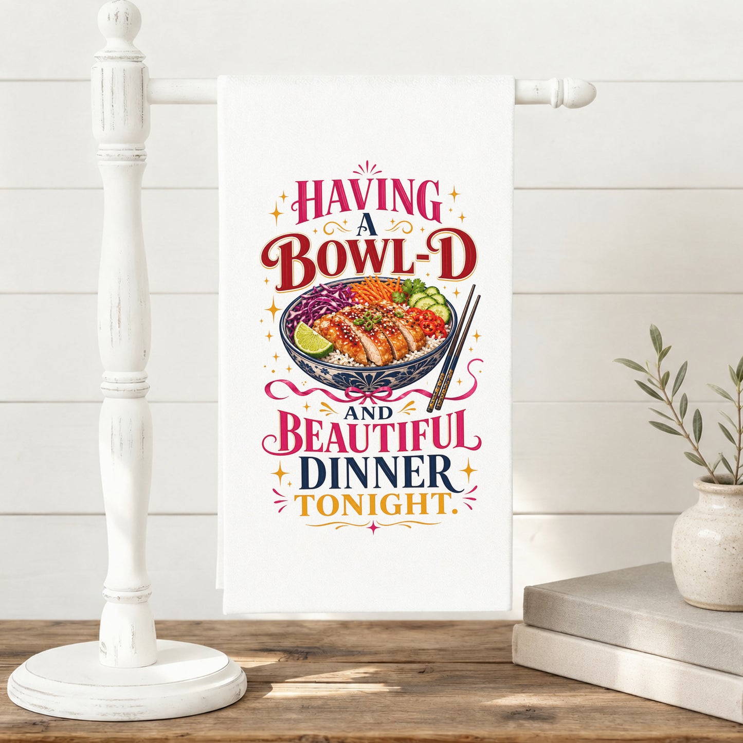 Bowl-d and Beautiful chicken rice dinner pun tea towel displayed on a freestanding towel stand.
