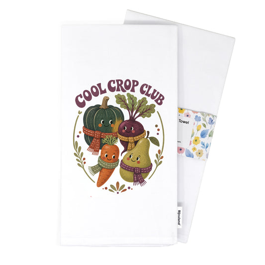Folded Cool Crop Club Harvest Tea Towel presented with its paper belly band and woven label.