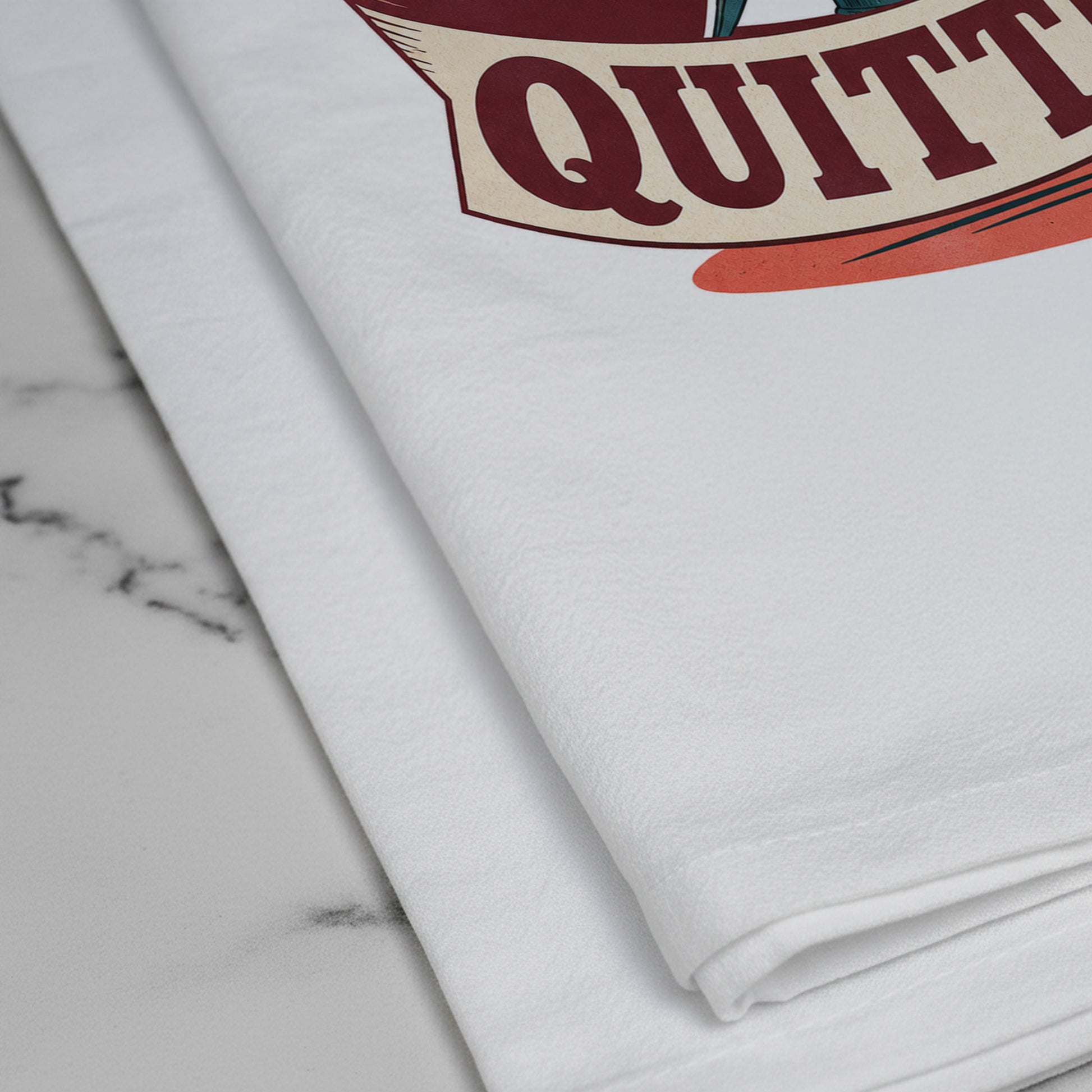 Close-up of the Corks Are for Quitters corkscrew artwork printed on the towel.