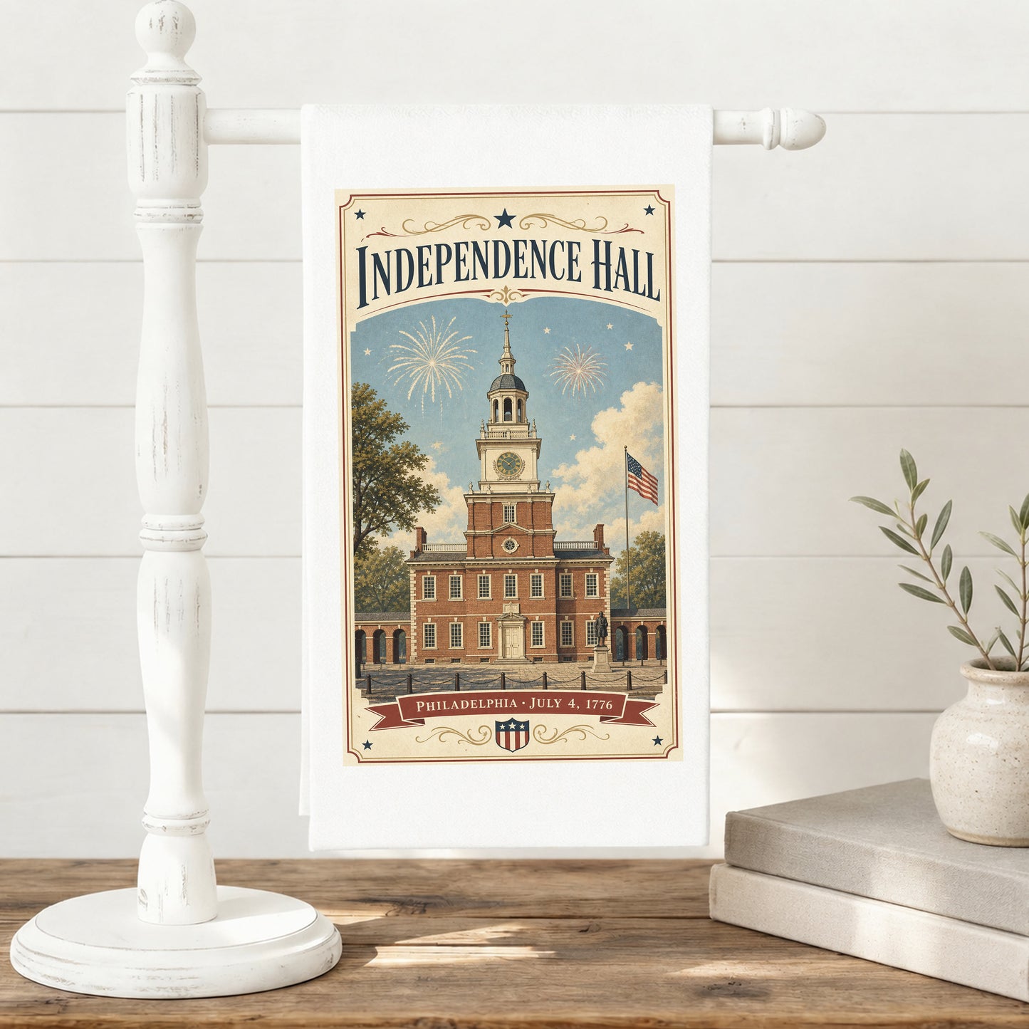 Independence Hall postcard tea towel displayed on a towel stand