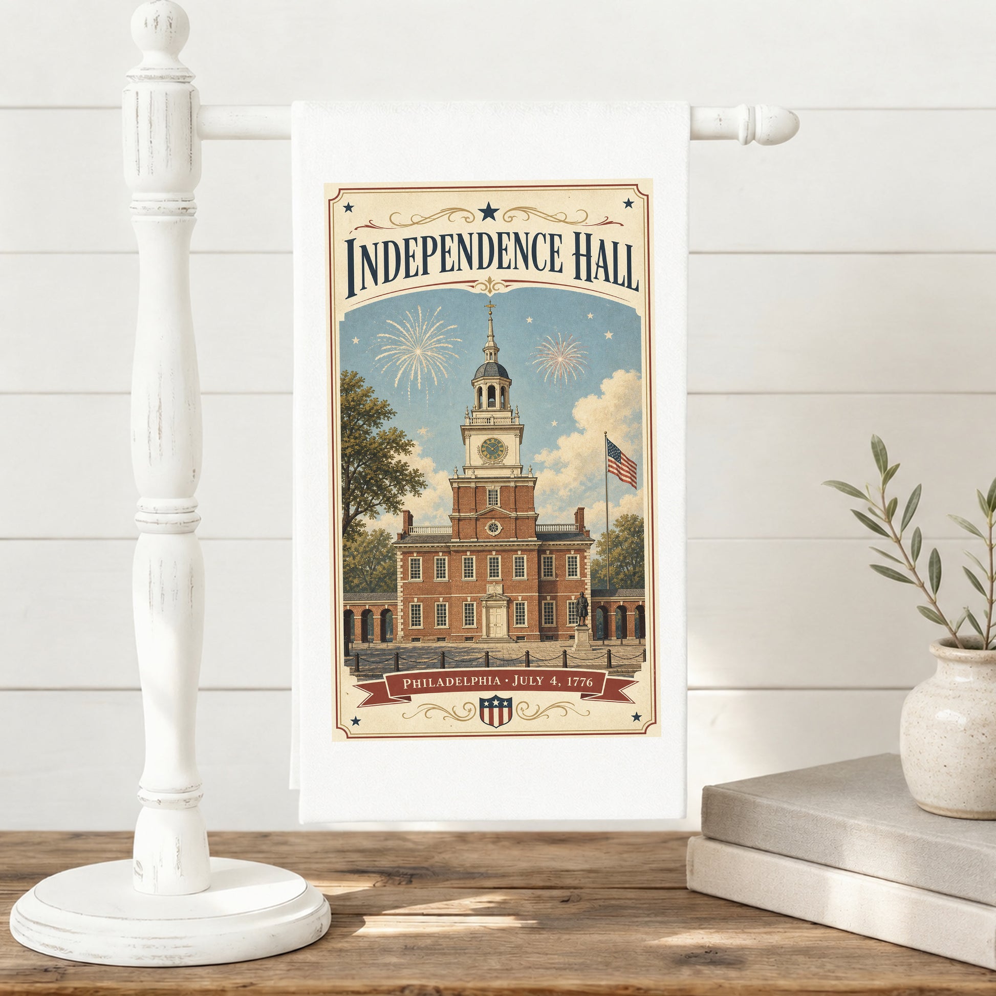 Independence Hall postcard tea towel displayed on a towel stand