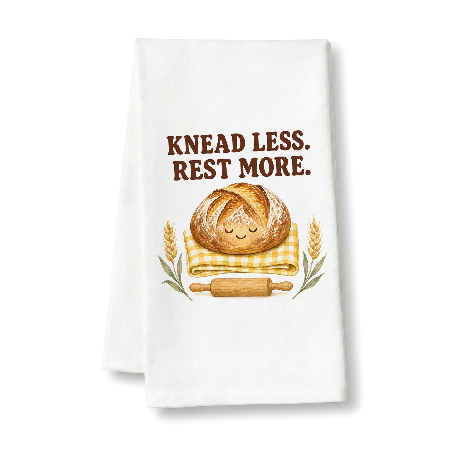 White tea towel printed with the Knead Less Rest More design featuring a sourdough loaf, shown flat on a white background.