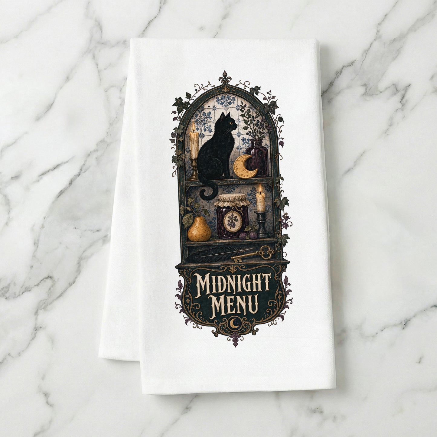Midnight Menu Black Cat Halloween Kitchen Towel folded on white marble, with black cat, candlelit pantry, moon cookie, pear, preserves, and antique details clearly shown.