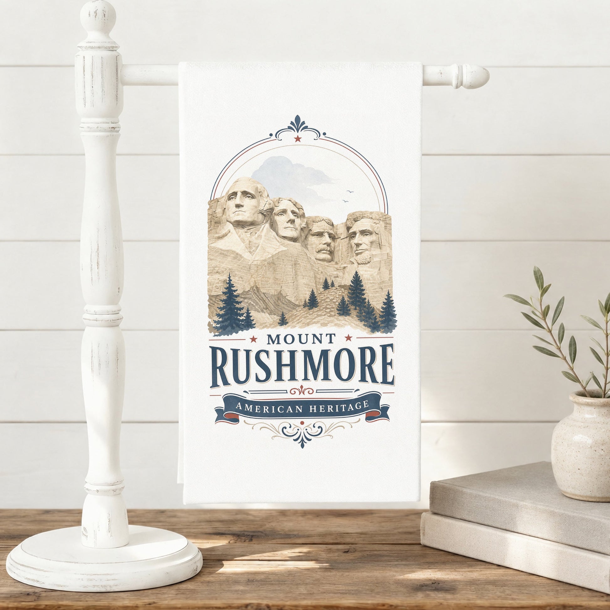 Mount Rushmore Heritage Tea Towel displayed on a towel stand