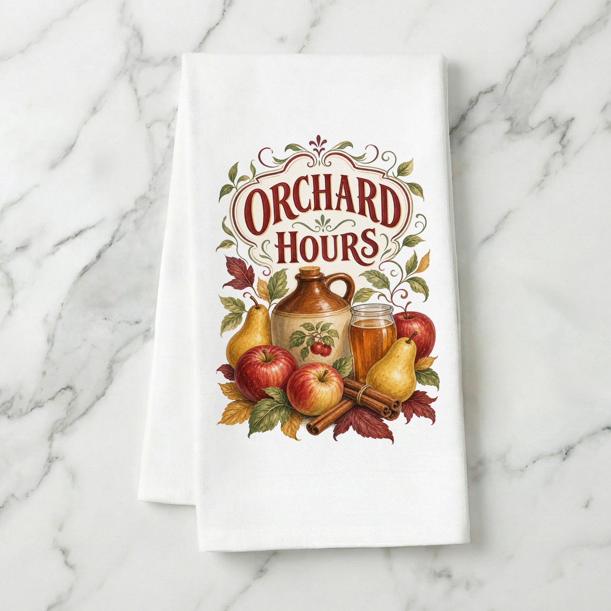 Orchard Hours Apple Cider Tea Towel folded on white marble, with apples, pears, cider jug and glass, cinnamon sticks, leaves, and vintage lettering clearly shown.