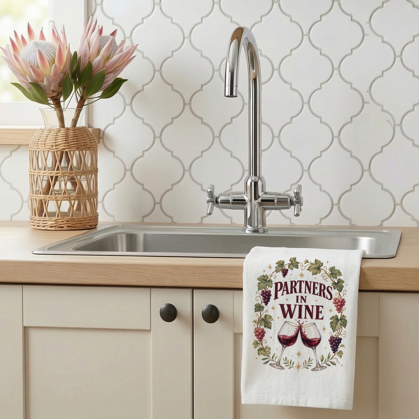 Partners in Wine kitchen towel styled beside a kitchen sink.