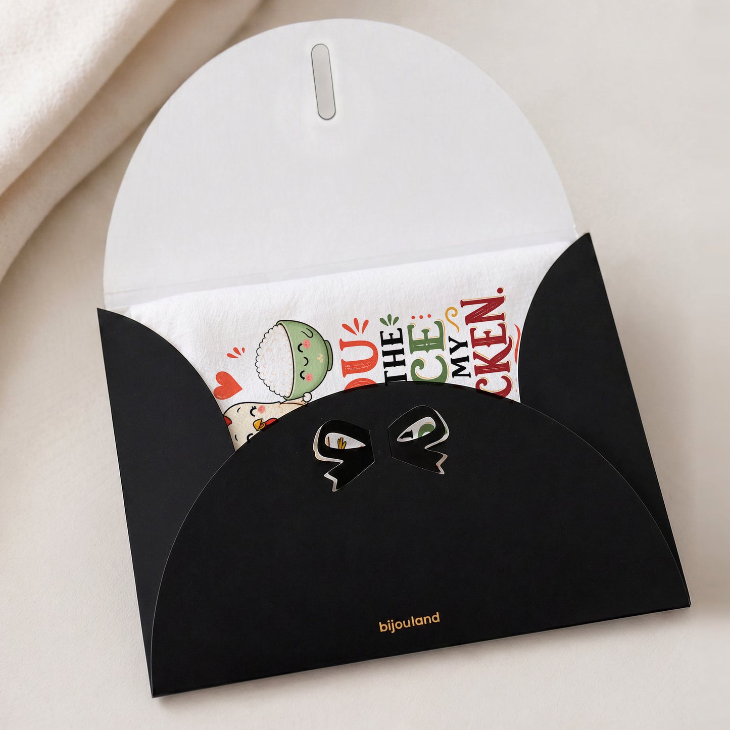 You Are the Rice to My Chicken kawaii food pun tea towel shown with the Bijouland gift-envelope packaging option.