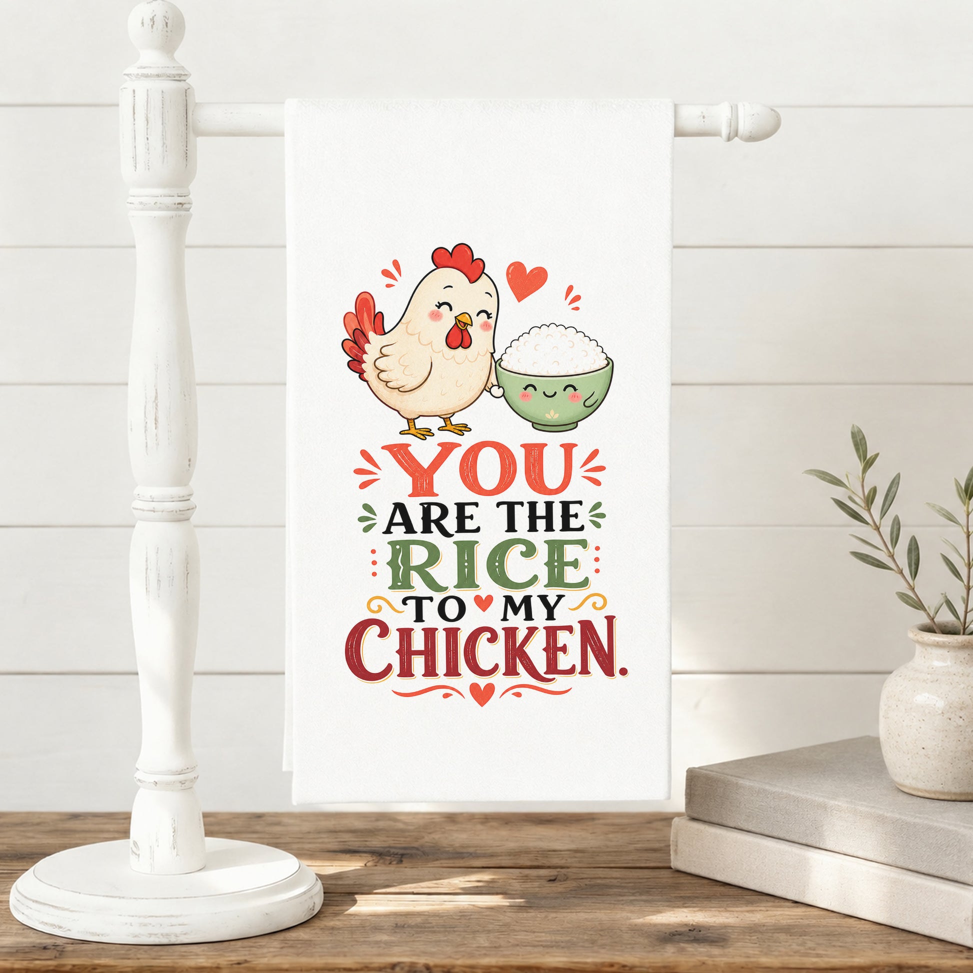 You Are the Rice to My Chicken kawaii food pun tea towel displayed on a freestanding towel stand.