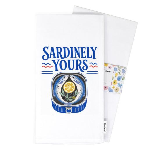 Folded Sardinely Yours tea towel presented with its paper belly band.