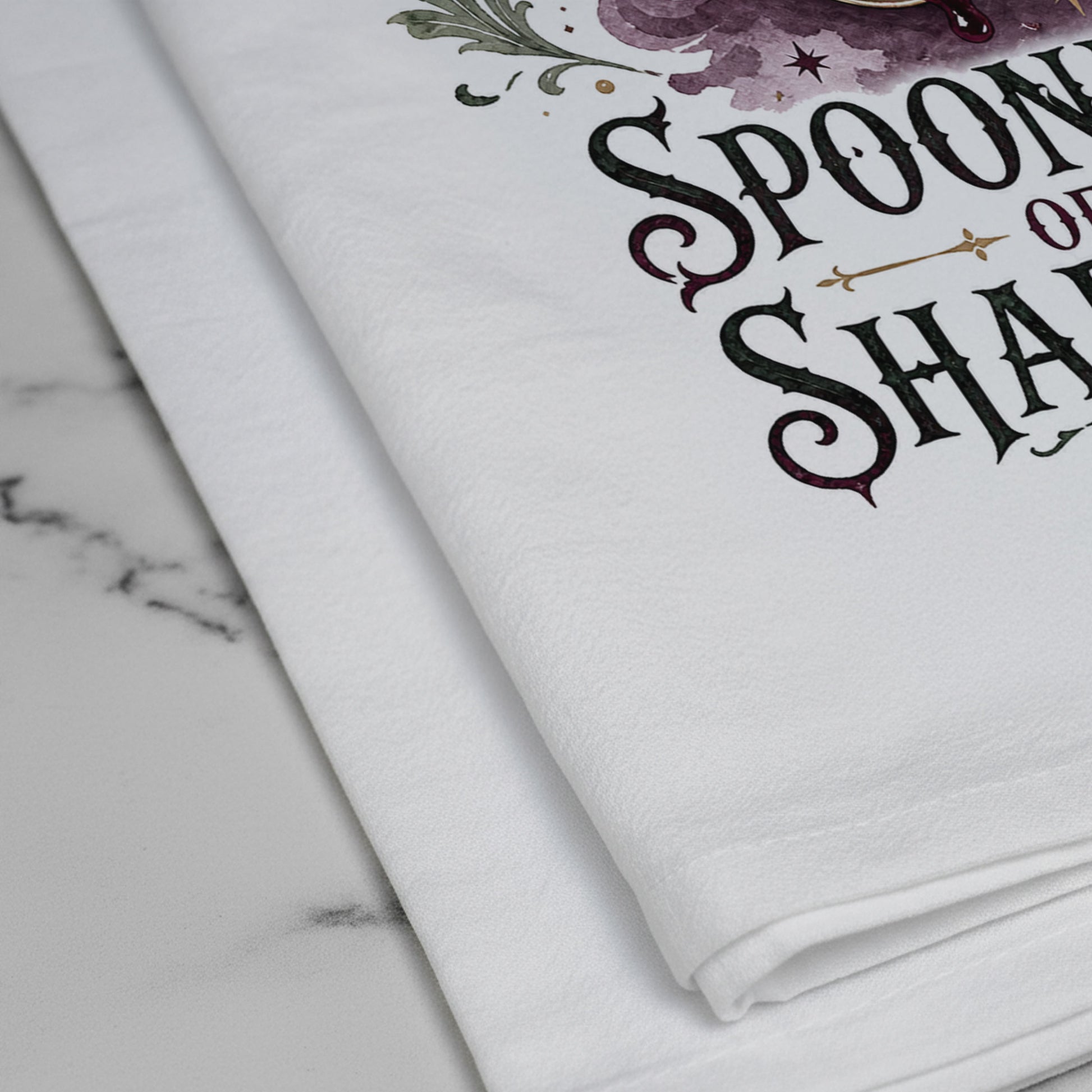 Close-up of the Spoonful of Shadows Gothic Halloween Kitchen Towel print showing ornate spoon, berry jam, curling ghost shapes, bats, and crescent moon on white flour sack organic cotton.