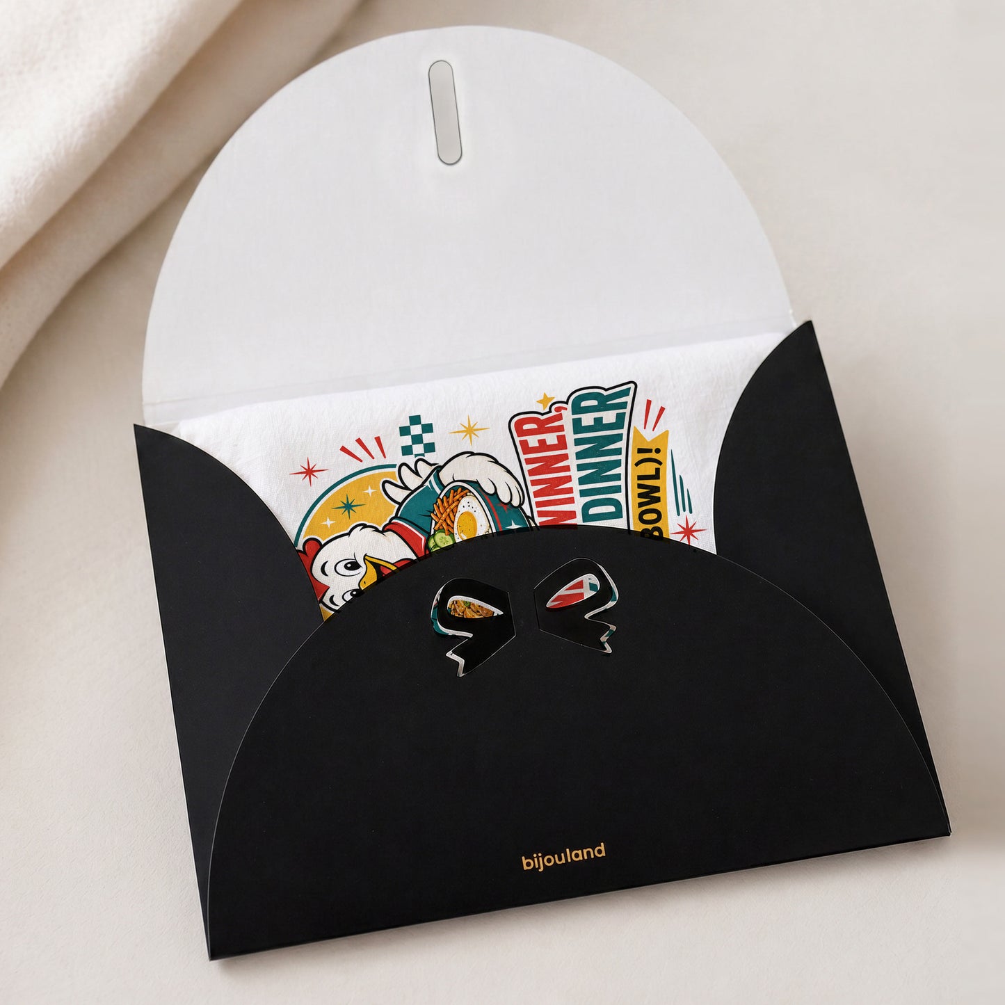 Winner Winner Chicken Dinner chicken and rice bowl tea towel shown with the Bijouland gift-envelope packaging option.