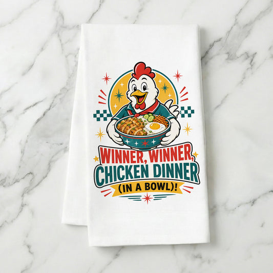 Winner Winner Chicken Dinner chicken and rice bowl organic cotton kitchen towel styled on a white marble surface.