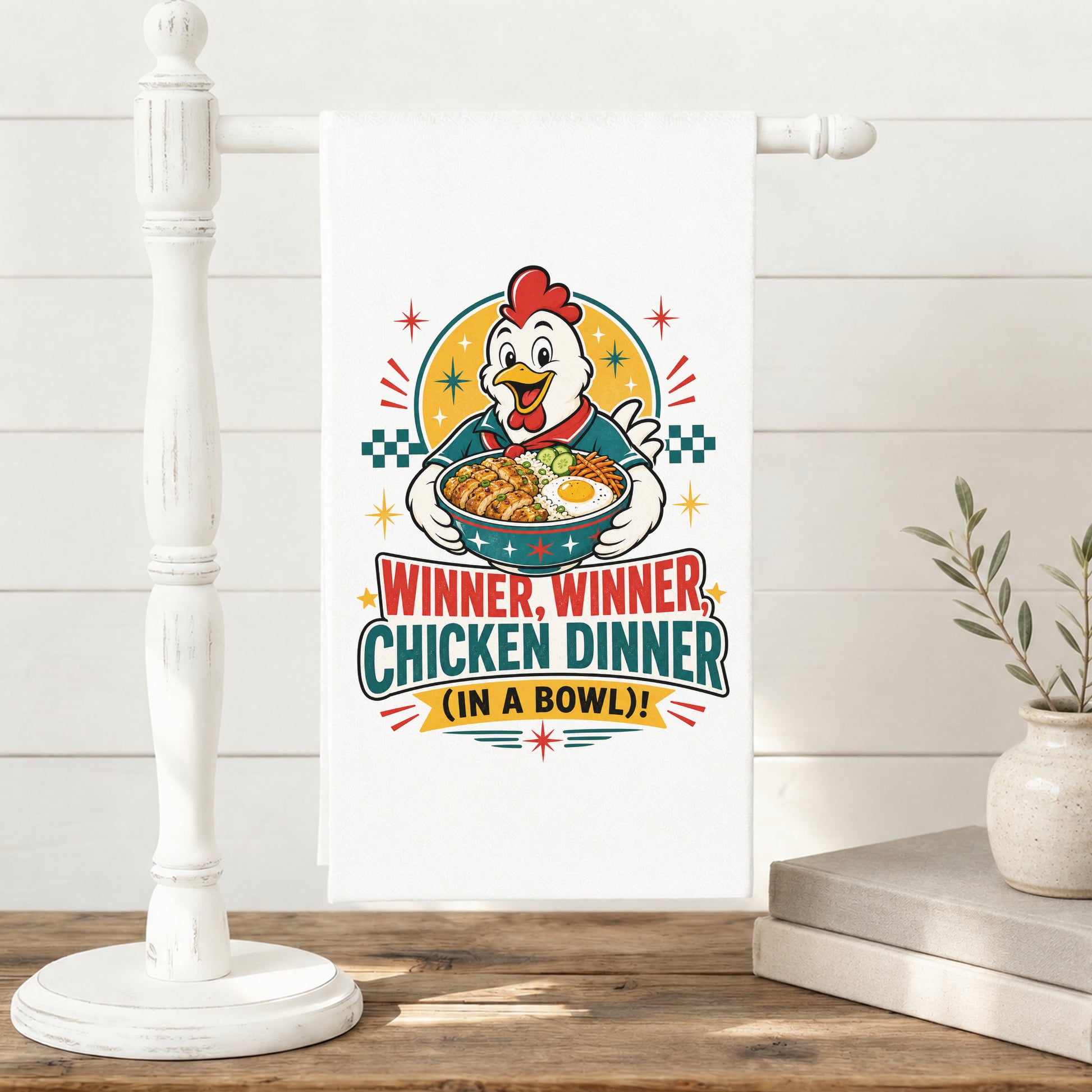 Winner Winner Chicken Dinner chicken and rice bowl tea towel displayed on a freestanding towel stand.